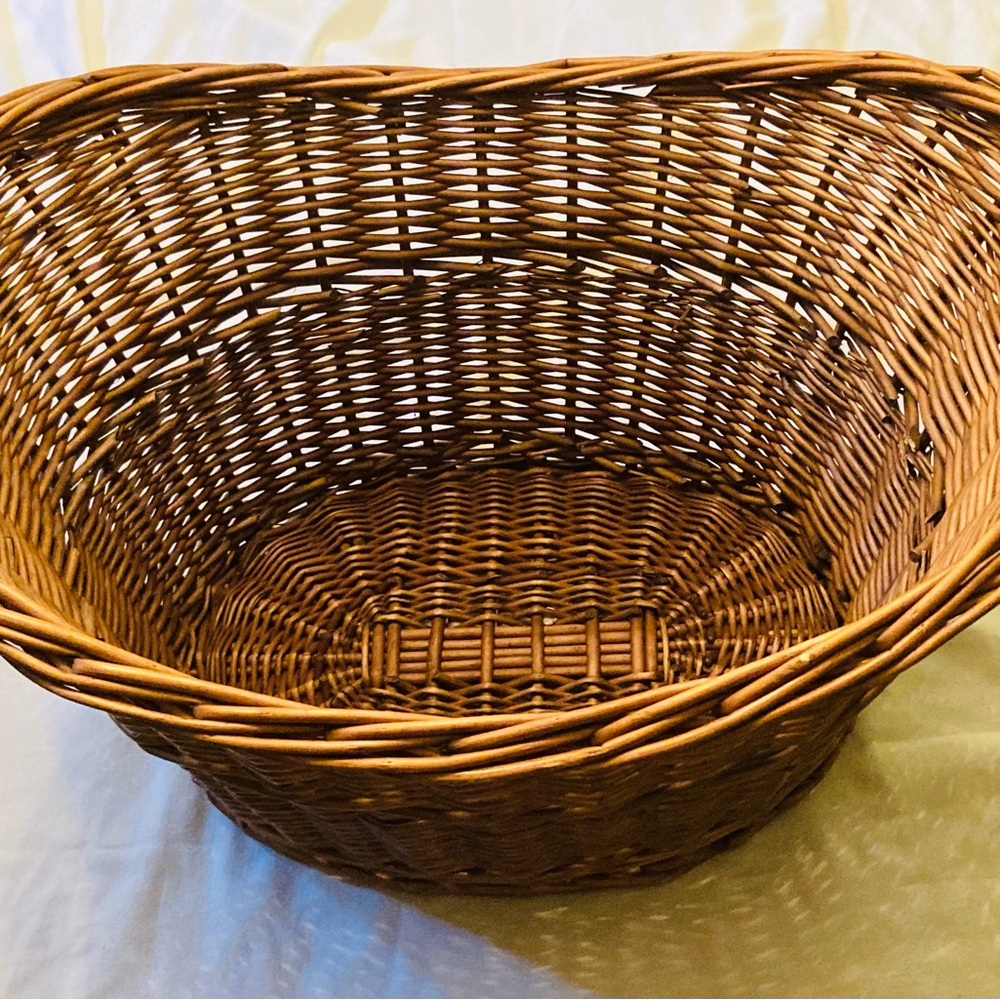 Large Vintage woven thick willow basket dual handles oval base up curve at top